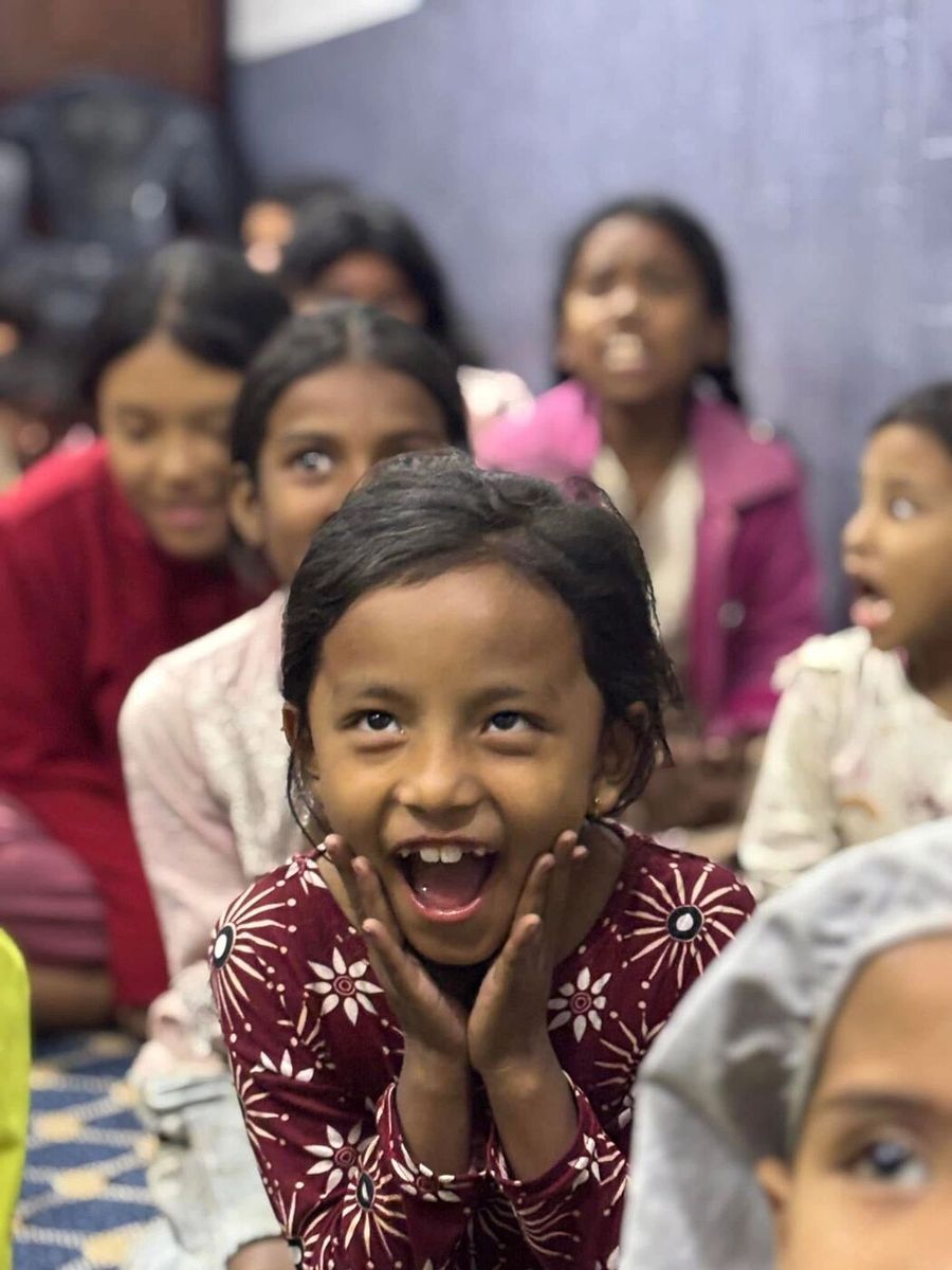 Two children smiling