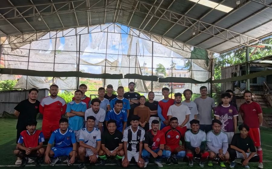 The TSP Sport Ministry futsal group gathered on the covered pitch